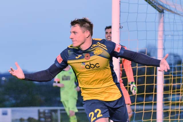 Kieran Roberts wheels away after scoring his second goal against Kidlington in the FA Trophy at the weekend. Moneys are back at Dover Road on Tuesday against Barnstaple in the Southern League. Picture: Martyn White.