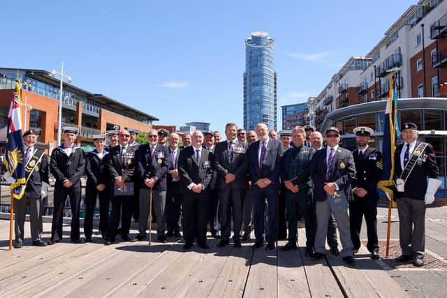 Serving personnel and veterans from the mine warfare and diving community at the dedication for the Vernon Monument