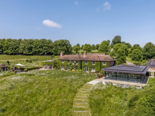 This six bedroom detached home is set in the countryside and it comes with six bathrooms and four reception rooms.