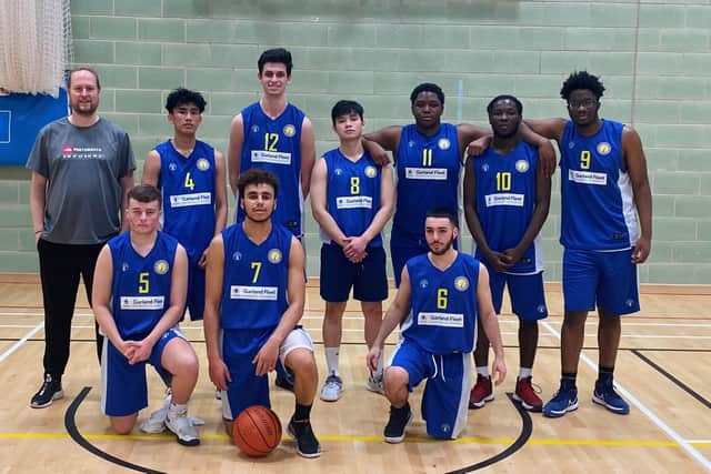 Portsmouth Basketball Club's senior team, pictured here with chairman Rob Milner, far left, are entering a team from the city into the national leagues for the first time in more than a decade from next season