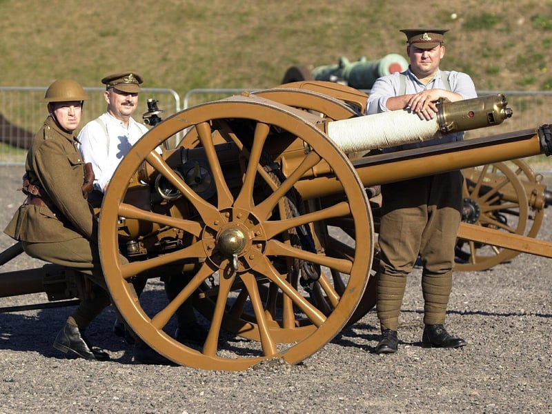 2003. Brockhurst Artillery re-enactors (l-r) Paul Jackson, Tony McNamara, and Graham Chadwick descended upon the Royal Armouries at Fort Nelson to man an 18lb. quick fire artillery piece amongst other activities open to the public demonstrating what life was like for soldiers in the Great War. Picture: Jonathan Brady 035103-39