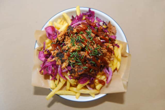 Loaded fries with pulled pork and slaw at Sisters Cafe