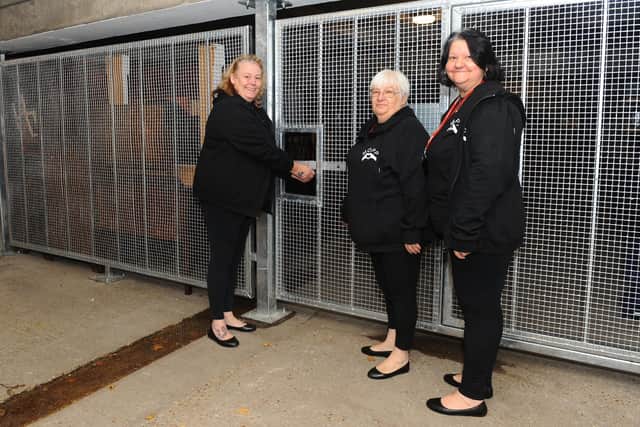 From lefr, treasurer and trustee Brenda Towle, secretary and trustee Jan Bone and chairman, founder and trustee Sarah Knight, opening the new gates.

Picture: Sarah Standing (131020-5630)