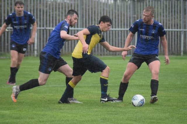 Josh Bailey runs at the Clanfield defence. Picture: Dan (JMA Media).