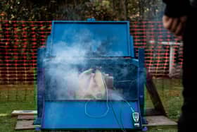 BLAZE OUT: A mobile phone which has burst into flames because of a faulty lithium-ion battery is safely contained and extinguished within and E:BAG. Barnbrook Systems and Flair's E:BAG can safely and quickly deal with such fires.