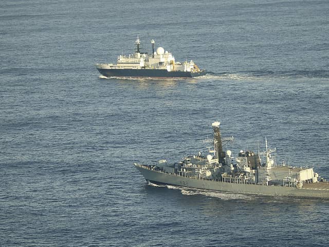 The Royal Navy could starting patrolling Irish waters in a bid to protect critical undersea infrastructure from Russia. Pictured: HMS Somerset flanking Russian ship Yantar near UK waters.