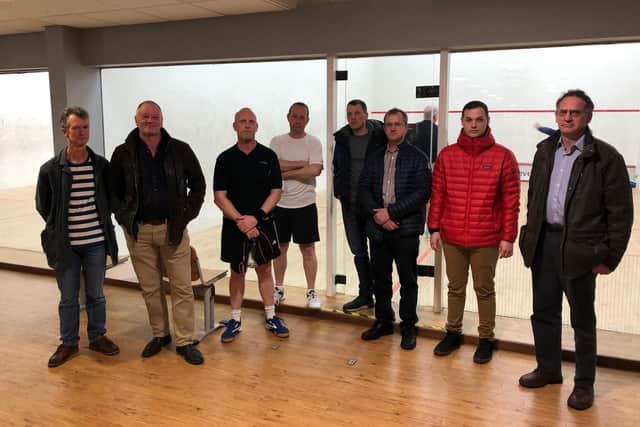 Members of the squash league, who are campaigning to keep the courts open.