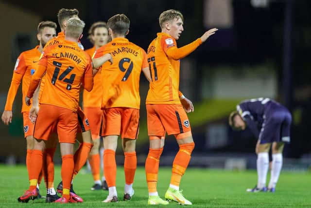 Ronan Curtis celebrates with his team-mates at Southend tonight