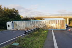 Officers received report of a lorry overturning and a car colliding with the lorry. Picture: Sussex Police