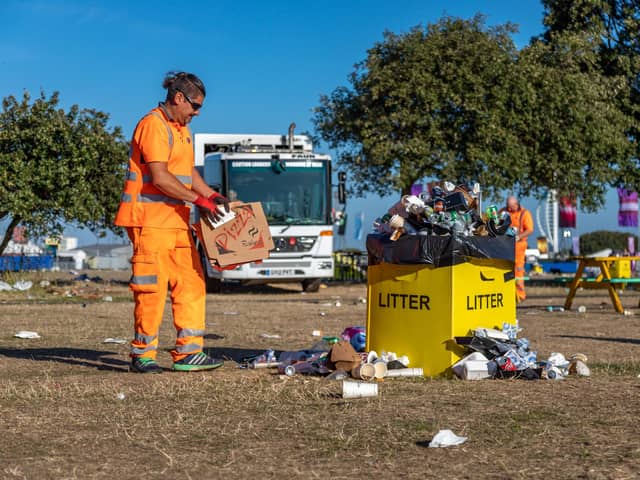 Clearing the Victorious festival site early on Monday morning. Picture: Mike Cooter (290822)