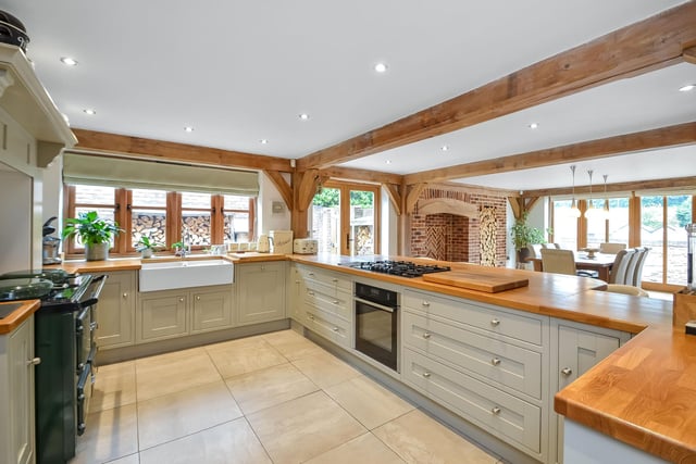 This five bedroom detached house is on the market at a £950,000 guide price. It is listed by Fine and Country.