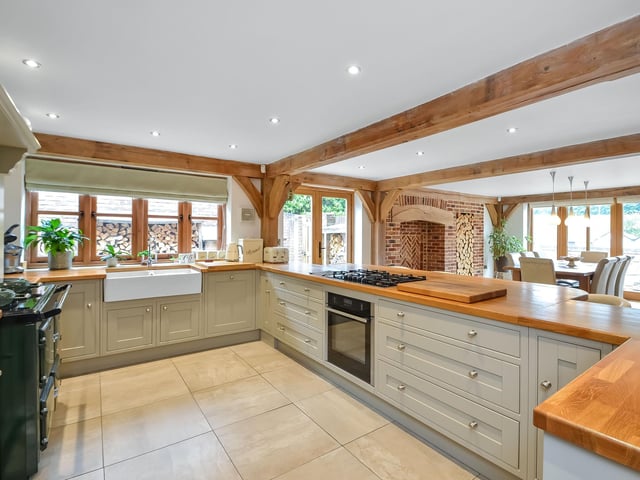 This five bedroom detached house is on the market at a £950,000 guide price. It is listed by Fine and Country.