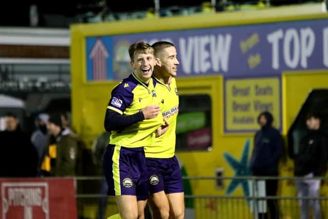 Mason Walsh, left, celebrates with Luke Hallett after grabbing Gosport Borough's second goal. Picture: Tom Phillips