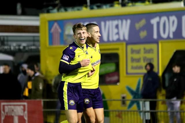 Mason Walsh, left, celebrates with Luke Hallett after grabbing Gosport Borough's second goal. Picture: Tom Phillips