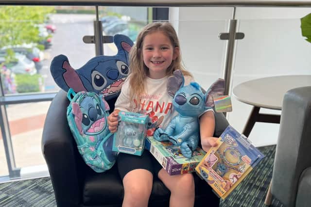 Sophie received a Stitch-themed prize bundle during her visit to Whiteley.