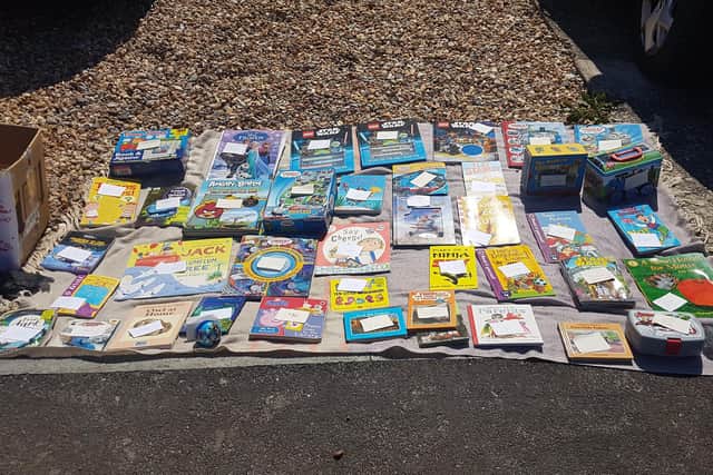 Jacob Lee, 9 from Purbrook, has set up his own pop-up shop on his driveway to sell his old books and raise money for the NHS