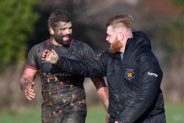 Muddy marvel - Southsea Nomads' Billy Wilkinson, left
Picture: Neil Marshall