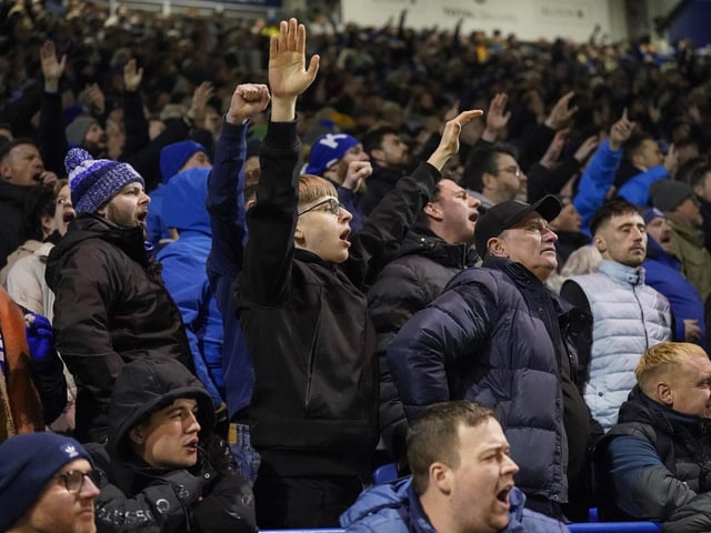 Pompey fans backed their team to a crucial Championship survival win over Cardiff last night.
