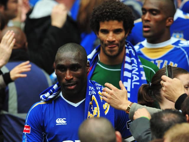 LONDON - MAY 17:  Sol Campbell and David James of Portsmouth makes their way down the Wembley steps after victory following the FA Cup Final sponsored by E.ON between Portsmouth and Cardiff City at Wembley Stadium on May 17, 2008 in London, England.  (Photo by Shaun Botterill/Getty Images)