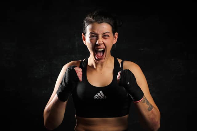 Elley Booth poses for a portrait during a photo session at Brown's Gym. Photo by James Chance/Getty Images.