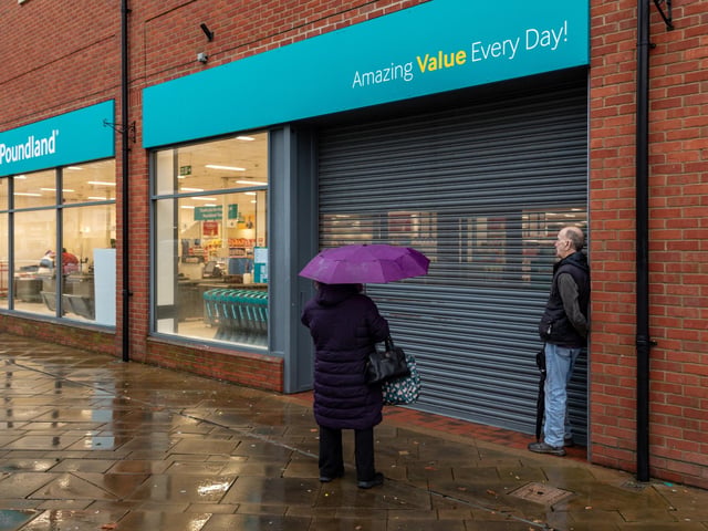 Customers waiting for the opening of the newly located Poundland store in West Street, Fareham. Picture: Mike Cooter (091223)