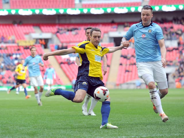 Justin Bennett, left, in action for Gosport Borough against Cambridge United in the 2014 FA Trophy final at Wembley. Picture: Paul Jacobs