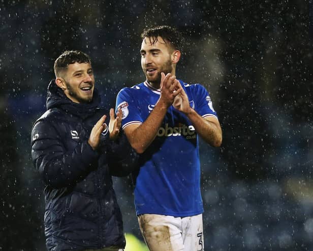 Ben Close, right, seen with fellow home-grown Pompey player Conor Chaplin, will not be returning to Fratton Park with Doncaster on Saturday. Picture: Joe Pepler