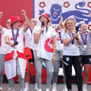 England players sing Sweet Caroline on stage during a fan celebration to commemorate England's historic UEFA Women's EURO 2022 triumph in Trafalgar Square, London. Picture date: Monday August 1, 2022.