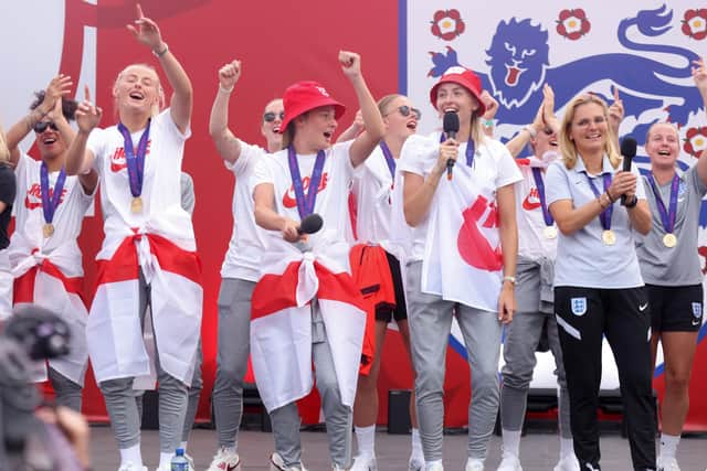 England players sing Sweet Caroline on stage during a fan celebration to commemorate England's historic UEFA Women's EURO 2022 triumph in Trafalgar Square, London. Picture date: Monday August 1, 2022.