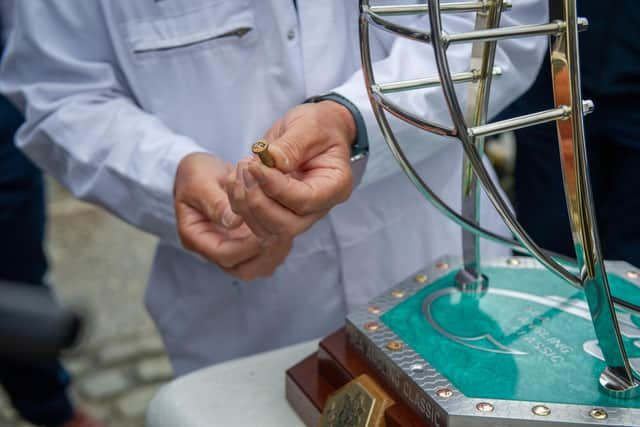 Detail shots of the Sea Angling Classic Trophy, made from various shot parts including wood from the Mary Rose outside HMS Victory, Portsmouth Picture: Habibur Rahman