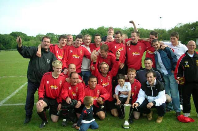 Fleetlands with the Wessex League Division 2 trophy in 2006. The club are now aiming to return to the Wessex in the near future.