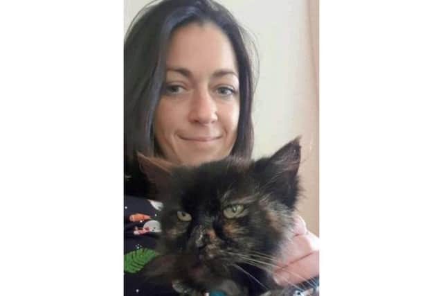 Photo issued by the Cats Protection of Jo Harris-Joce with Strawberry, the Long-haired cat went missing in June 2014 after failing to return to her home in Stoke, Plymouth, but was reunited with her owners – Lee and Jo Harris-Joce – in December 2023.

Photo credit should read: Jo Harris-Joce/PA Wire