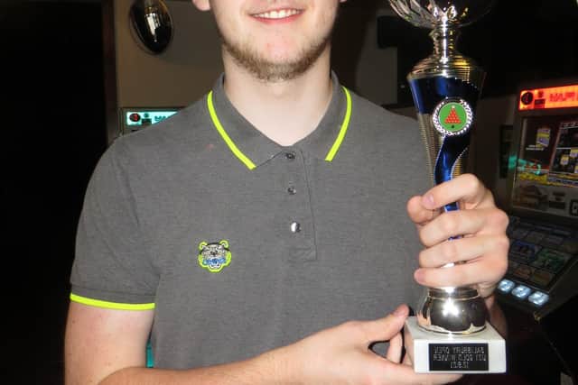 Jamie Wilson with his Cuestars trophy in Salisbury.