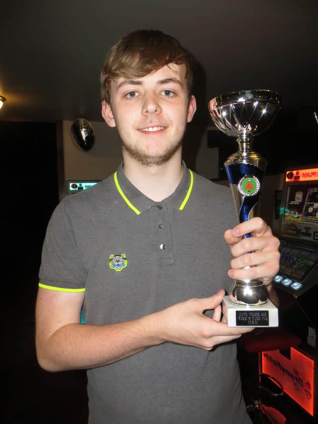 Jamie Wilson with his Cuestars trophy in Salisbury.