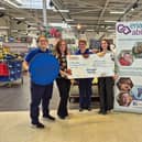 From left to right, Gemma (Tesco Fratton Community Champion), Hollie (Enable Ability), Tesco colleague, and Mia (Enable Ability)