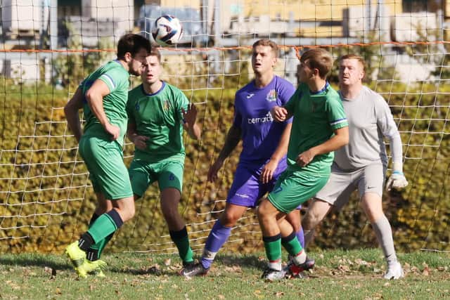 Cowplain (green) v Friends Fighting Cancer in Division 4 of the City of Portsmouth Sunday League. Cowplain won 3-0. Picture by Kevin Shipp.
