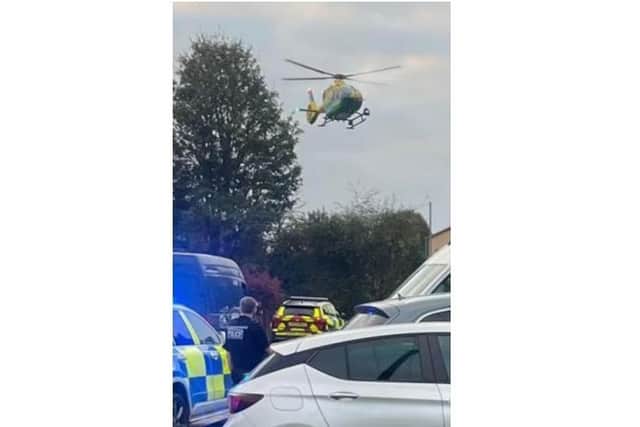 Police and air ambulance in Cinderford Close
