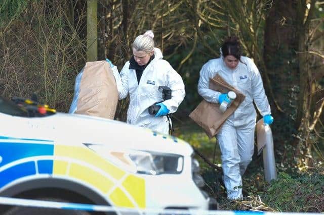 Police forensics at the scene after a baby was found dead in woodlands in Hythe, near Southampton last year. Picture: Solent News & Photo Agency