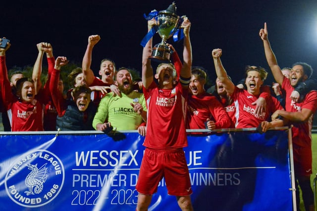 Skipper Ash Howes raises the Wessex League trophy. Picture by Martyn White