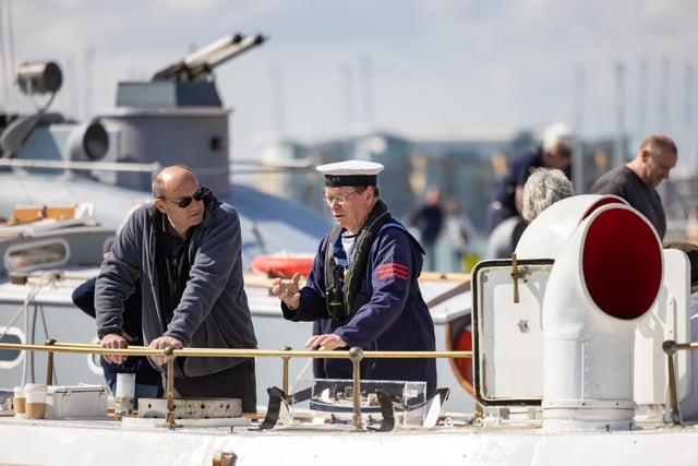 Visitors aboard the historic craft in Portsmouth Harbour. Picture: Mike Cooter (08042023)