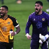 Tom King (right) celebrates with Newport County's Joss Labadie after Sunday's play-off League Two semi-final success over Forest Green Rovers. Picture: Steven Paston/PA Wire