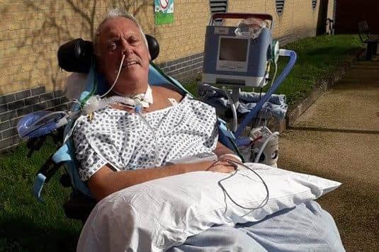 Veteran firefighter Mark Jones was struck down with Guillain-Barre Syndrome (GBS) after being diagnosed with pneumonia while on holiday. He is pictured outside Queen Alexandra Hospital during his lengthy recovery.