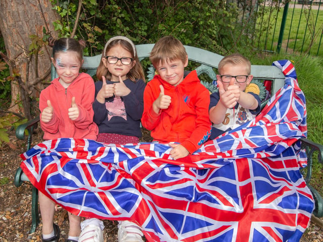 Mengham Infant School on Hayling Island created a coronation community garden - pictured are Alana, six, Billy, five, Archie, five, and Maddy, five, at their new garden