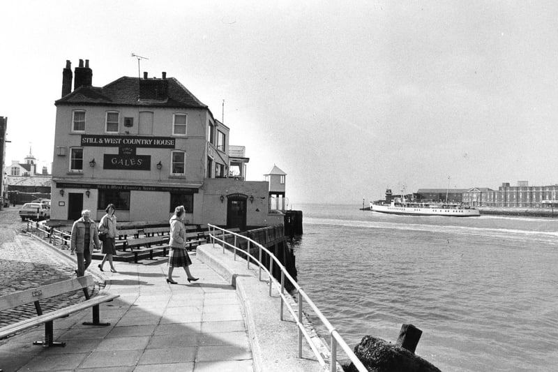 Walkers pause to look at the view of Portsmouth Harbour from Spice Island in April 1985. The News PP3491