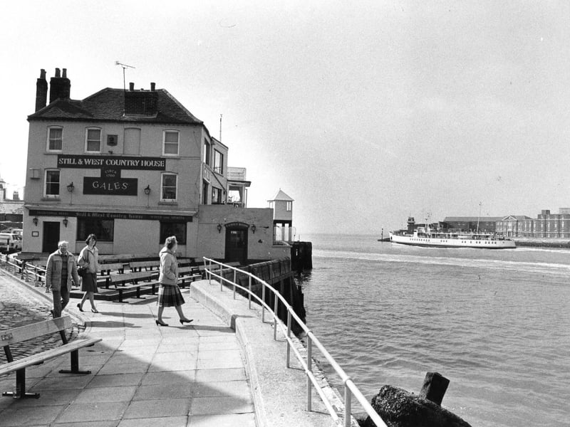 Walkers pause to look at the view of Portsmouth Harbour from Spice Island in April 1985. The News PP3491