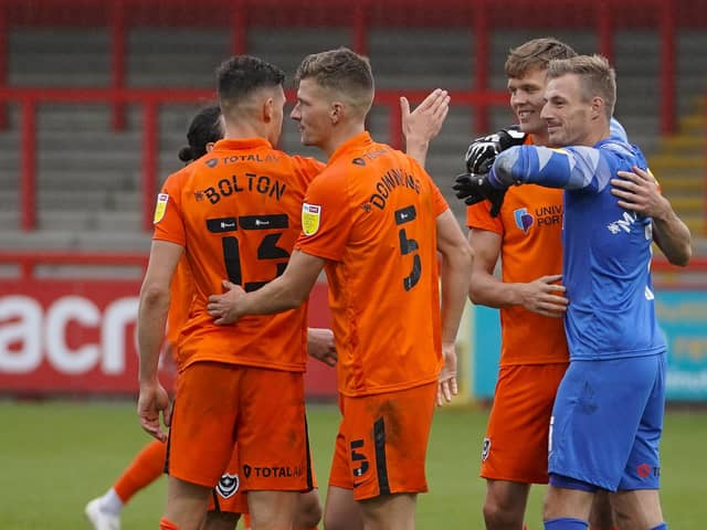 Pompey celebrate their Carabao Cup win at Stevenage. Picture: Jason Brown