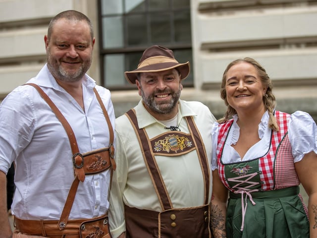 Portsmouth Guildhall played host to this years Oktoberfest event, with hundreds of guests over two sessions and German themed live music.Pictured - Mr Bennington, with Dave and Claire Robertson, celebrating their 11th Wedding AnniversaryPhotos by Alex Shute