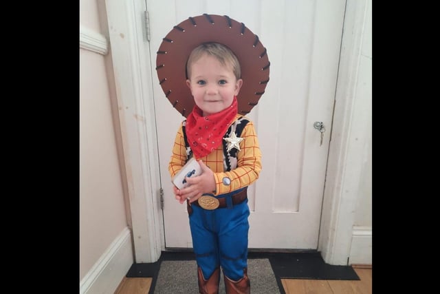 George, three, as Toy Story's Sheriff Woody