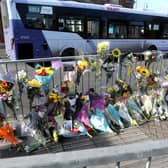 Flowers pictured at the scene where a Gosport teenager died after being hit by a bus outside Gunwharf Quays in Portsmouth, Hampshire, UK.

Picture: Sam Stephenson.