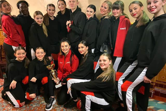 Portsmouth dance teacher Nicole Romasz and her team have been selected to represent England in the Dance World Cup in Rome in June.

Pictured: Nicole Romasz, who coaches and directs the Astarz Romasz Elite, and her team after winning a recent street dancing competition. 